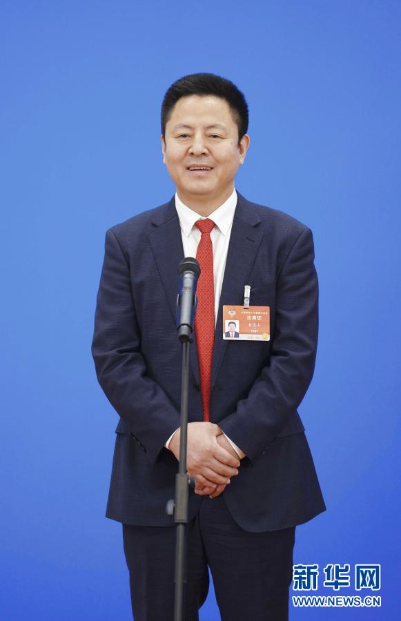 你的“命”，在我“心”上——兩次走上“委員通道”的敖虎山委員